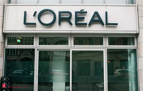 l'oreal buys prada